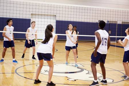 high-school-volleyball-match-in-gymnasium.jpg